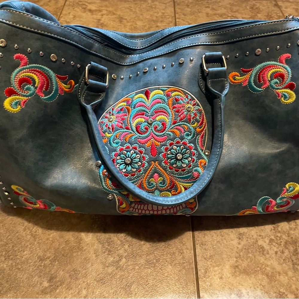 Blue Montana West travel bag
